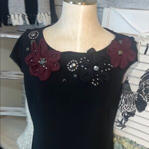 Chic Black Midi Dress with Floral Embellishments